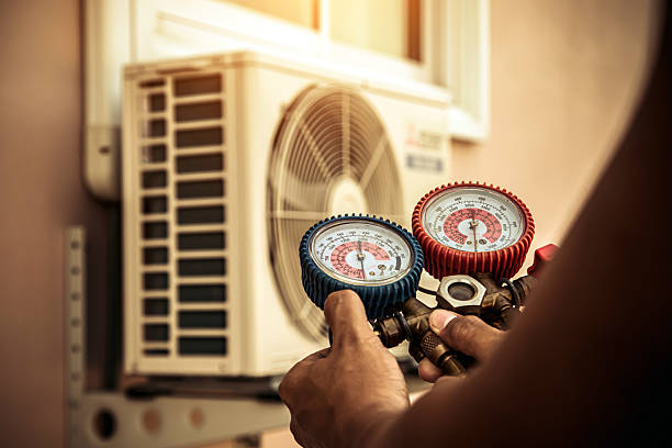 Professional Heat Pump Repair technician working in Fountaintown, IN